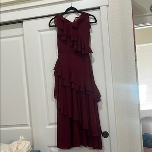 Elegant Burgundy Ruffle Dress
Children’s size 8 
Amazing quality 
Worn once